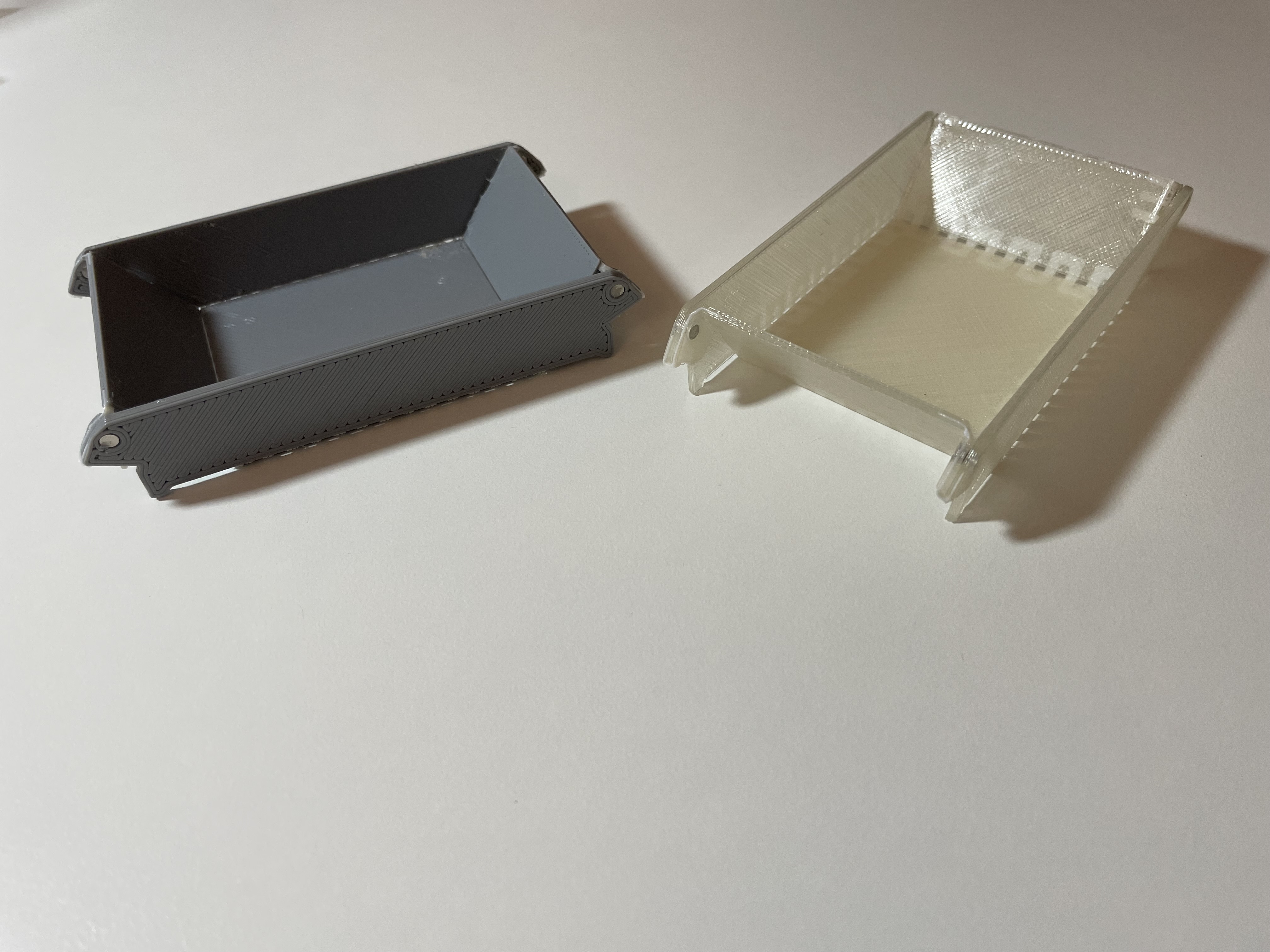 two folded trays from different angles